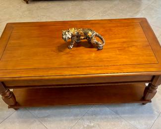 Invisible fencing keeps the tiger contained on the tabletop. Great conversation piece.