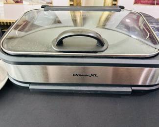 She wants grilled hamburgers but it's 95 outside. Crisis avoided.