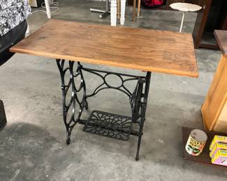 Table with a Sewing Machine Base