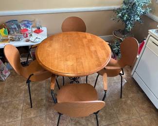 Table 4 chairs. Has "Danish Modern" feel to it