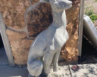 We have 6 cement dogs