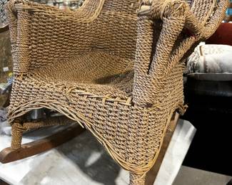 Child’s antique woven rocking chair