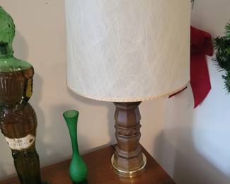 Pair of Mid-Century Modern wooden lamps with fiberglass lamp shades. 