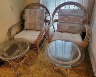 Vintage 1970s Oversized Rattan Chairs with matching coffee tables.