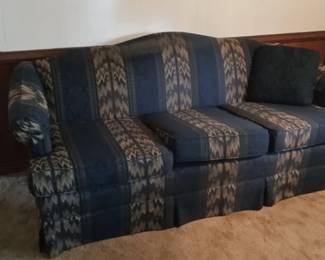 Sofa - Blue with stipe details. 70" long, 30" deep, 32" high.
