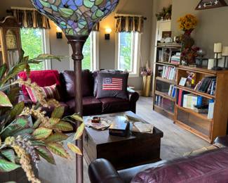 Tiffany style electric loveseat and sofa, vintage bookcases, three door and four-door vintage square coffee table with storage