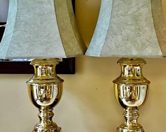 a pair of heavy brass lamps… Up for auction this Saturday