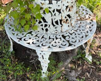 Wrought iron wrap around tree bench!