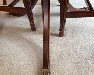 Duncan Phyfe table with extra leaves and top cover.