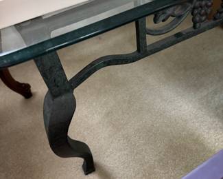 Wrought and heavy glass coffee table