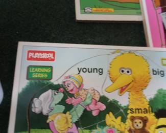 several Playskool puzzles