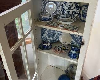 Primitive white cabinet w glass doors
Blue and white plates