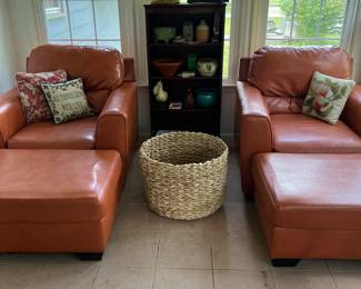 Pair orange Durablend lounge chairs and ottomans