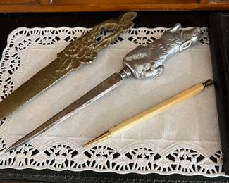 Figural brass letter openers