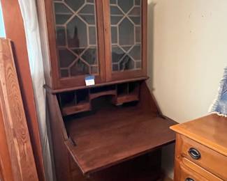 Solid mahogany secretary desk with 3 drawers below and glass curio cabinet above