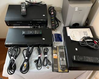 Miscellaneous Blu-ray player, VCR, sub-woofer, cassette player, HDMI cords, universal remote, power strip