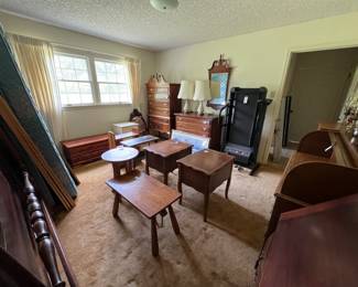 Mahogany dresser and chest in back top of picture near windows. Other items in room are miscellaneous tables, treadmill, cedar chest, and queen size mattress (never used)