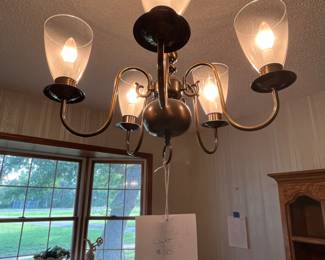 Hanging chandelier in dining room