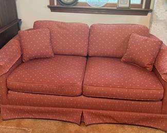 2 cushion couch with pillows