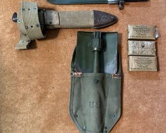 1950's army equipment--shovel, toilet paper packs, belt, army knives and one with sheath