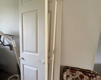 Two folding doors and one regular door for sale. Set of 4 TV trays are also for sale.