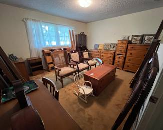 Spainhour solid maple bedroom set with full-size bed, dresser, chest, 2 nightstands, mirror (shown on back top of picture)--Other items in room are multiple antique chairs and cedar chest