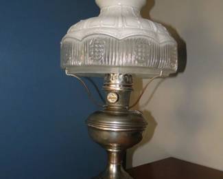 Yes, real and authentic, with nothing wrong with this oil lamp at all. All the original pieces
