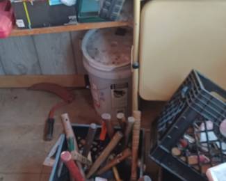 Assorted hammers and used tools