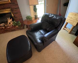 black leather chair with matching ottoman - great condition