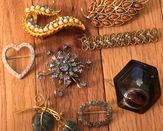VIN Brooches