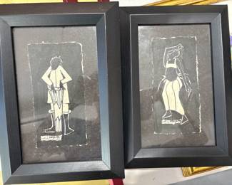 Woodcut print of figure playing drum