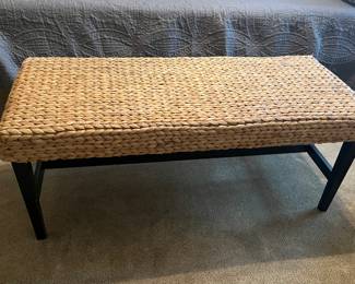 Woven grass bench