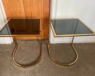 Pair of glass topped brass end tables