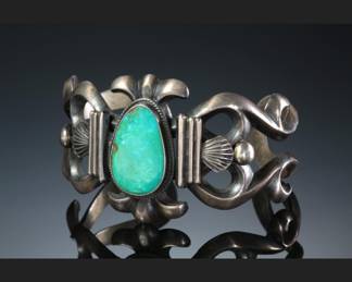 Native American sand cast with turquoise