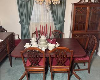 All pieces of antique Duncan Phyfe dining set are being sold together as one set (dining table with 6 chairs, china cabinet, buffet and server).