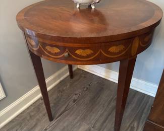Round mahogany accent table