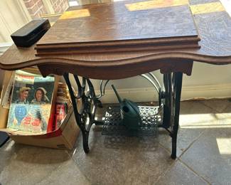 antique sewing machine. drawers are available, but not attached