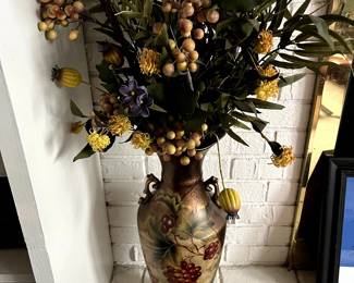 Lots of silk and dried flower arrangements and interesting vases