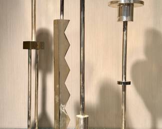 $200 each; artisan made silver plate candlestick by Ettore Sottsass Swid Powell; 13"h