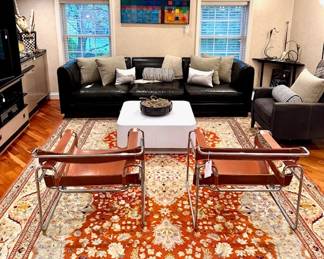 (SOLD--Baker Furniture black leather, 3-piece sectional couch with curved corners; 115x39x32) (modern, white laminate square coffee table with curved corners; 36x36x15) (SOLD--notted wool rug with terracotta and slate blue primary colors, great condition and timeless pattern; approx 10'x13')