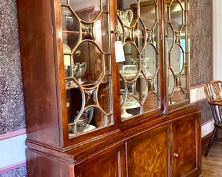 $2200; china hutch with beautiful beveled glass upper doors and inlaid wood details on bottom doors; 2 coordinating pieces also for sale; 57x16x78
