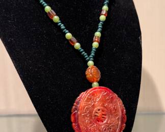 SOLD; red jade pendant on beaded necklace