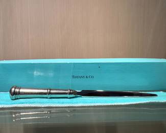 $150; letter opener by Tiffany with box and dust cover
