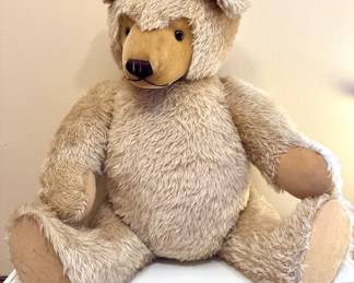 $400; extra large stuffed Steiff teddy bear