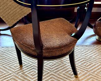 $600 each (3 available); Leopard print custom upholstered dining chair by Baker Furniture with black and gold accents; 21x21x32; view of the back