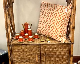 ($500 each-2 available-vintage MCM rattan cabinet with two doors and 1 drawer; 33x50x17) (SOLD--custom made down pillow with orange and ivory geometric pattern) ($100; Copodimonte Arnart Milan demitasse set; 14 pcs)