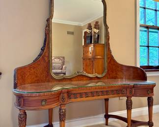 $1200; elegant 3-drawer vanity with curved corners, glass top, gold gilded mirror built in and beautiful wood grain