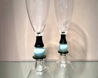 $250; pair of Steven Maslach sand molded, glass double sided goblets; 11.5"h