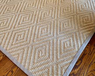 $600; gray colored jute rug with diamond pattern and rubber-backed; (as is--has a couple spots with lightened color); approx 9'x12'