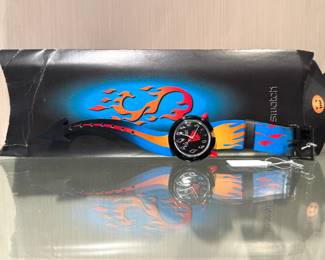 $80; Pop Swatch watch "Hot Stuff"